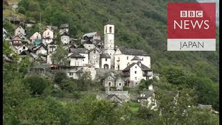 空き家対策に「分散型ホテル」　スイスの山村で