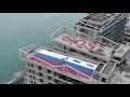 В Сочи начали сносить проблемный многоквартирный дом с 50-метровым флагом России