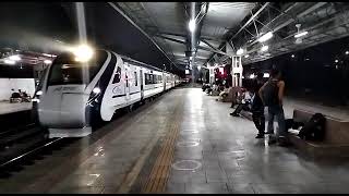 20902 Gandhinagar Mumbai Vande Bharat Express arrives at Vapi railway station.