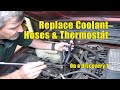 Coolant Hoses And Thermostat Replacement On A Land Rover Discovery 1