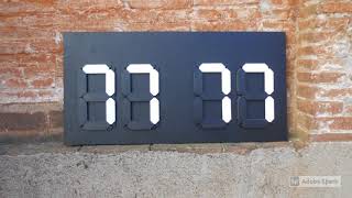 Clever Score Modules Used To Create A Simple Manual Sports Scoreboard With White Flip-Over Numbers.