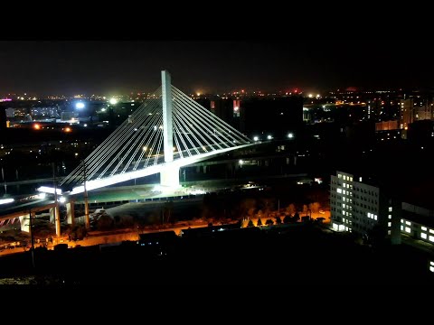 Spectacular! 15,000-tonne bridge in NE China rotates to position at night