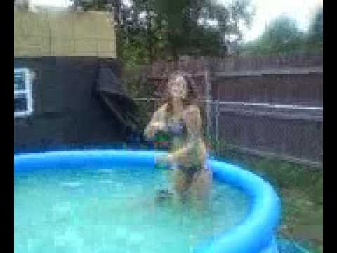 Sara dancing in a pool