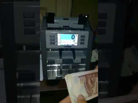 ماكينة عد نقود وكشف تزوير العملات المحليه والاجنبيه صناعة كورى