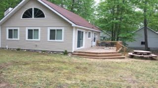 308 ACORN Dr, Roscommon, MI Presented by Jo Serum.