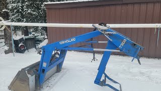 Removing a New Holland Loader