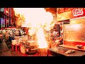 Extreme powerful fire wok cooking  lobsters and seafood  thailand street food   