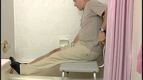 Bathing, using a tub transfer bench