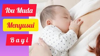 Ibu Muda Cantik Lagi Menyusui Bayinya