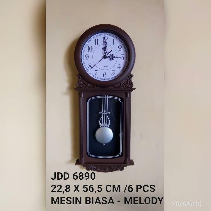 Jam dinding esa bunyi bandul bergerak