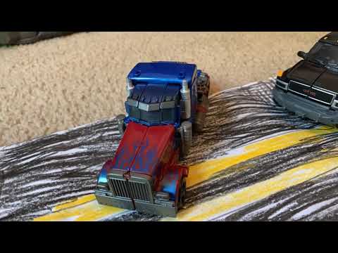 Transformers stop motion Optimus prime & ironhide vs bonecrusher & brawl.