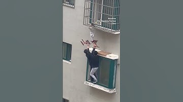 Neighbours rescue boy dangling from 4th-floor window in China #ytshorts