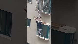 Neighbours rescue boy dangling from 4thfloor window in China #ytshorts