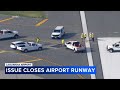 LaGuardia Airport runway temporarily shut down after depression found: officials