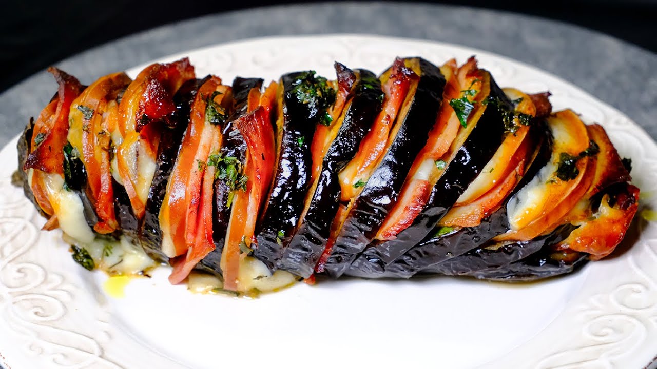 Melanzana al forno ripiena con prosciutto cotto e provola Un