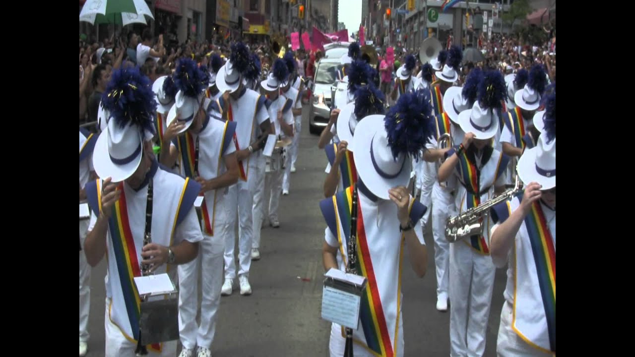 The Lesbian & Gay Big Apple Corps performs at the 2011 Toronto Pride Parade