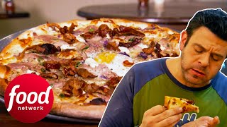 One Of The Best Pizzas Ive Ever Had Adam Tries Drunken Duck Pizza Secret Eats With Adam Richman