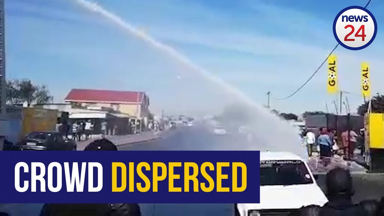WATCH | Police use water cannons to disperse crowd in Cape Town - News24