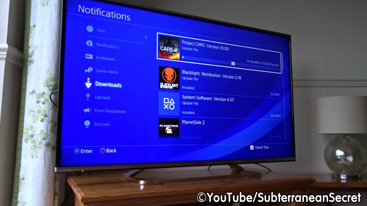 how to pause a download on ps4