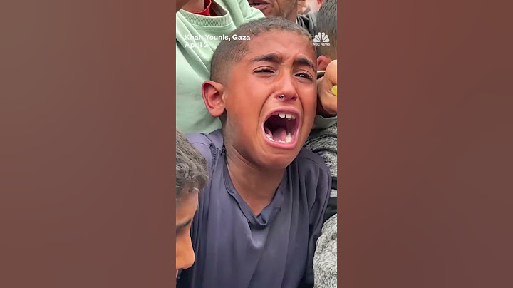 Hungry children struggle for food handouts in Gaza