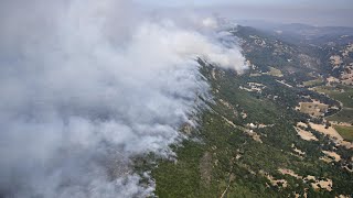 Footage captured from a plane reveals the extent of california
wildfires which have so far claimed lives 10 people. fires affected
st...