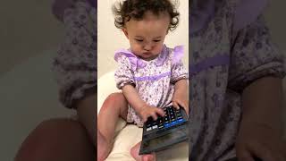 Baby using calculator #babygirl #sevenmonths #funny #cute #calculator #math #buttons #number #first