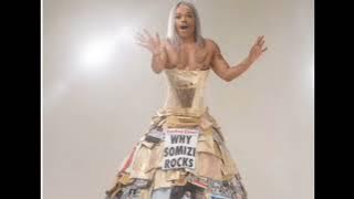 Somizi Mhlongo Turns Heads at Durban July with Newspaper-Inspired Fashion Masterpiece
