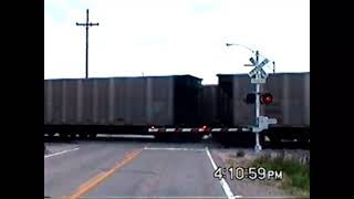 BNSF 9445 leading empty coal train west leaving Grand Island 