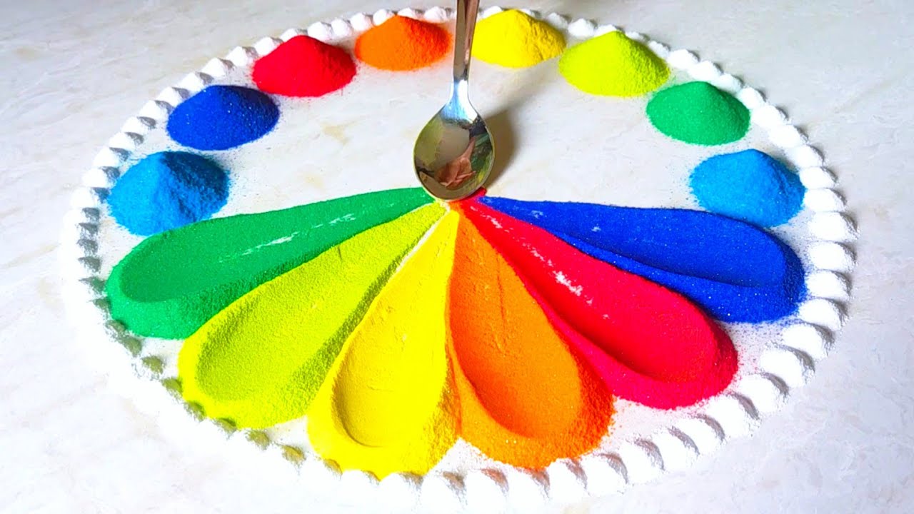 spoon rangoli design |रंगोली डिजाईन | Simple rangoli - YouTube