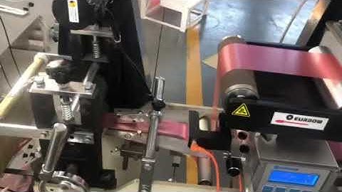 Automatic draw tape bag making machine