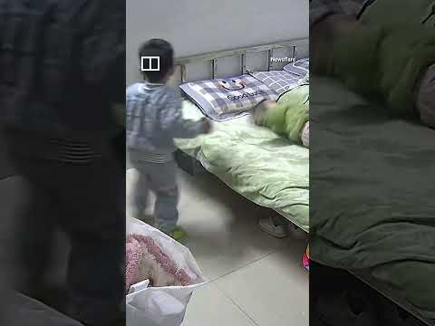 Boy puts baby sister to sleep while mother is at work #shorts