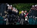 King charles iii inspects honor guard