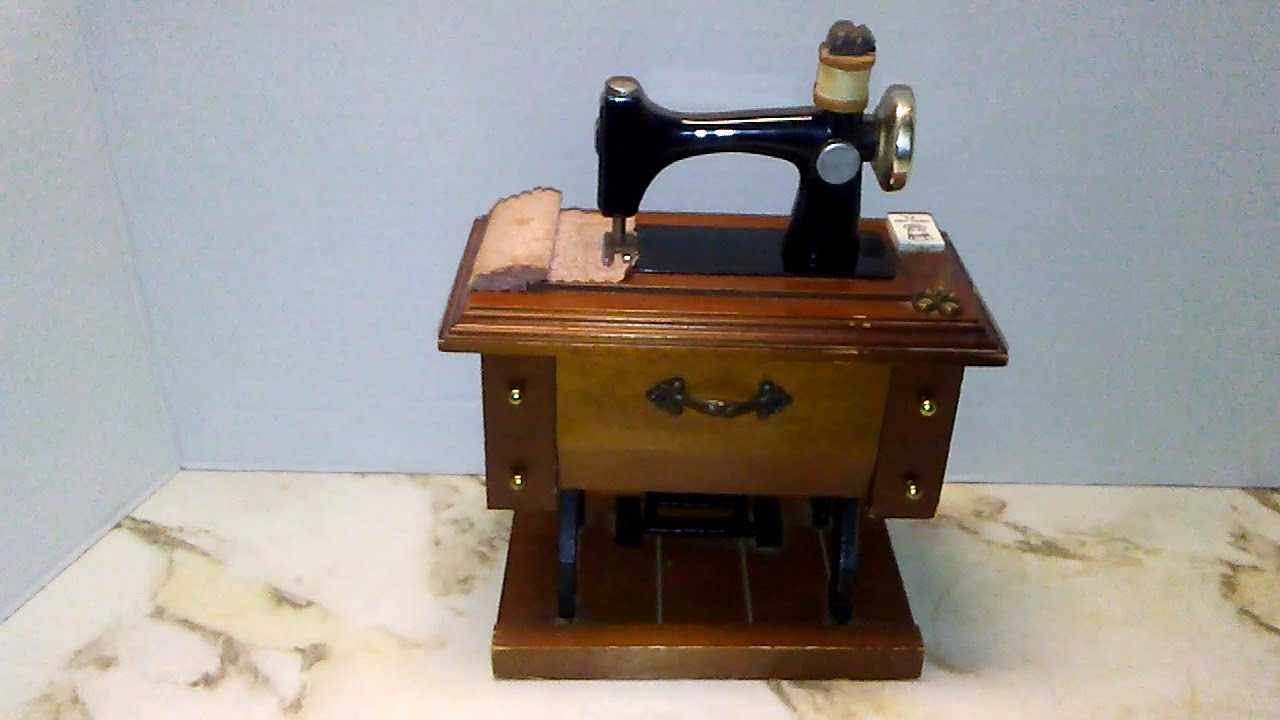 Treadle Sewing Machine Wind Up Music Box plays BUTTONS & BOWS YouTube