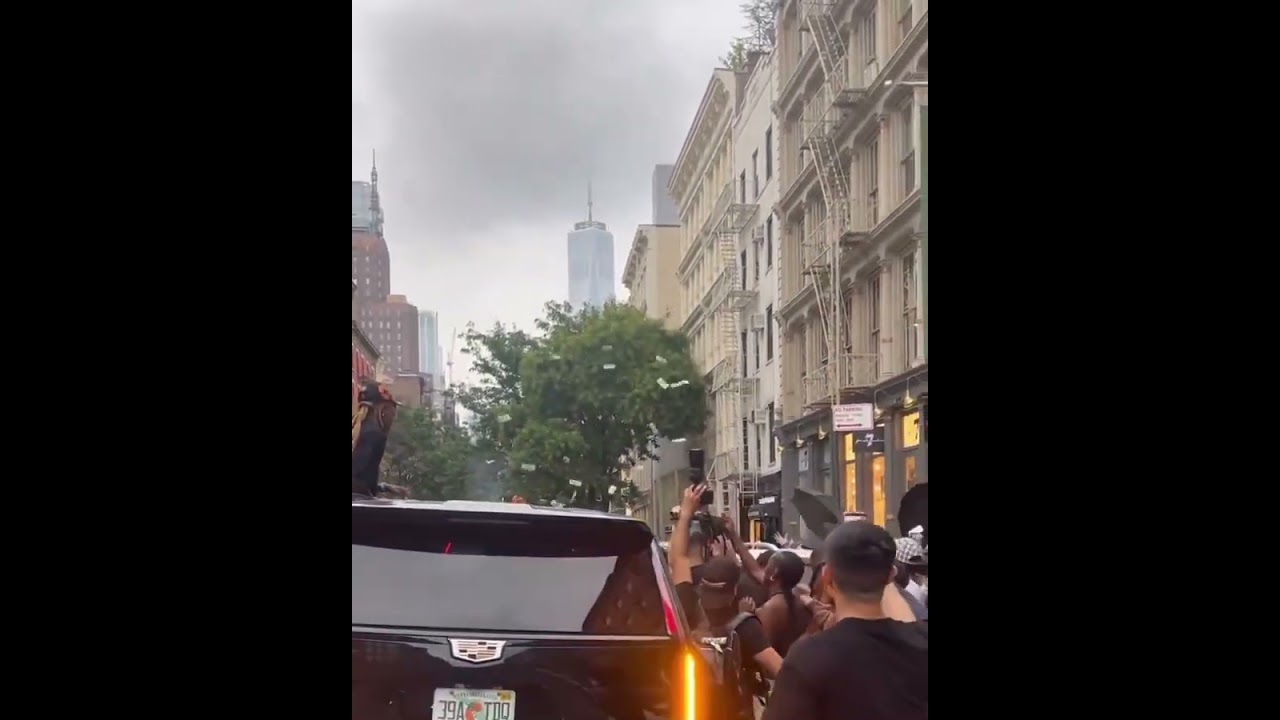 Offset throwing $100 bills in the street at his pop up shop with DenimTears in 