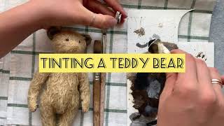 Tinting in vintage style a teddy bear. Mohair bear