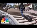 This Smart Suitcase Traverses Stairs Like A Tank | The Pulse | CNBC