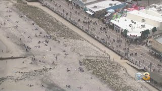 Beachgoers Soaking Up Sun Down The Shore