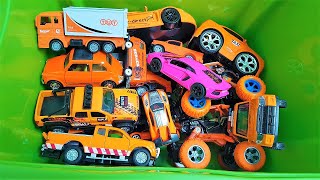 Orange cars and one pink from the box