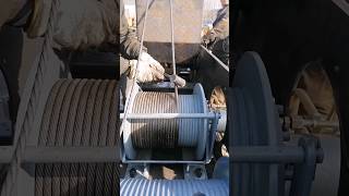Installing crane cables Installing crane cables