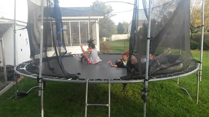 Maddie Cougill and friends jumping on a trampoline.