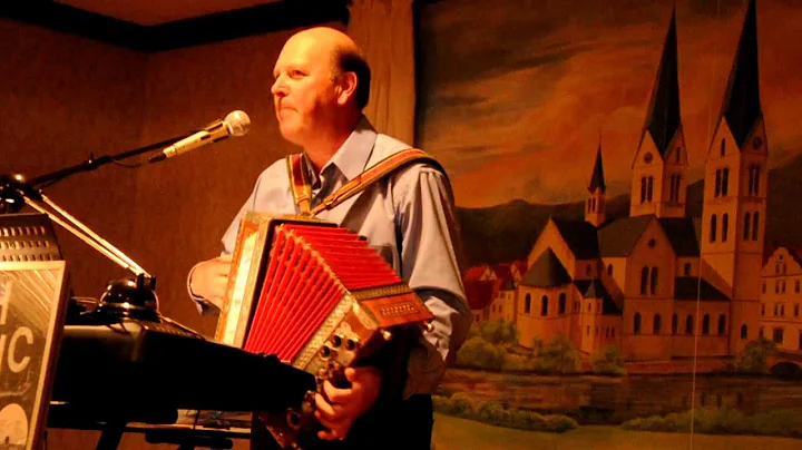Paul Belanich plays the accordion