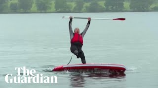 Liberal Democrat Leader Ed Davey Slips Off Paddleboard Into Lake