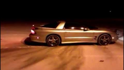 trans am ws6 doing donuts in the snow