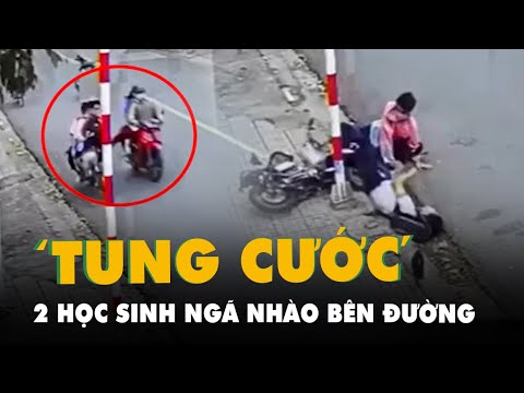 Video Xác minh vụ 2 học sinh bị người đi xe máy 'tung cước'... - youtube