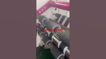 Automotive wire harness tape fitting strip rewinding machine