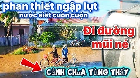 Nước chảy siết Tại phan Thiết-các xe Đi né lũ băng đường vòng mũi né
