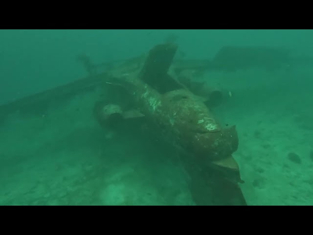 Scuba Dive Descending Down to the Plane Wreck | In...