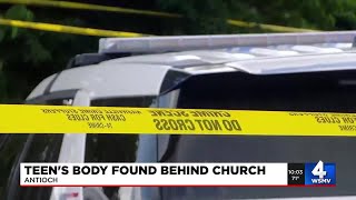 Teen's body found behind church