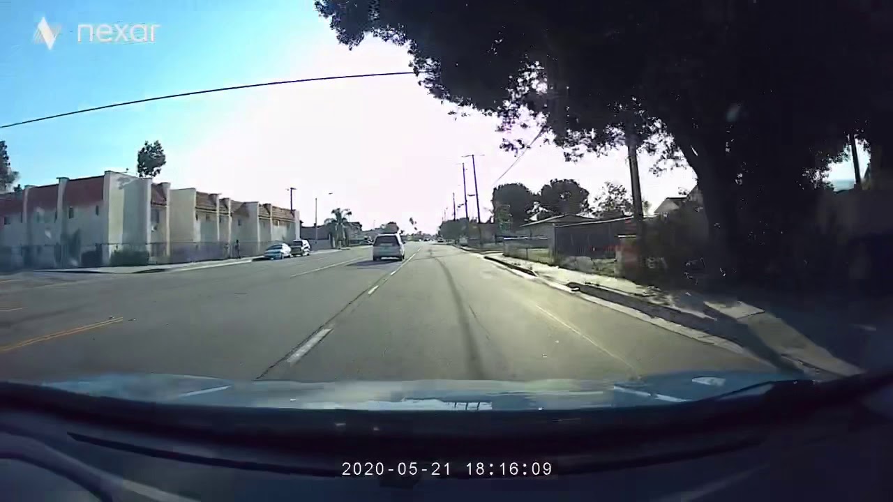 Driver jumps intersection - YouTube