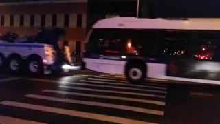MTA Articulated Bus Being Towed On West 42nd Street In Manhattan, New York